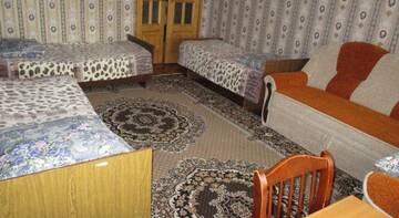 Фото номера Стандартный четырехместный номер Гостиница Guest house Vostochnaya 27 г. Дивеево 2