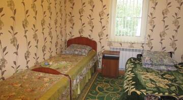 Фото номера Классический трехместный номер Гостиница Guest house Vostochnaya 27 г. Дивеево 4